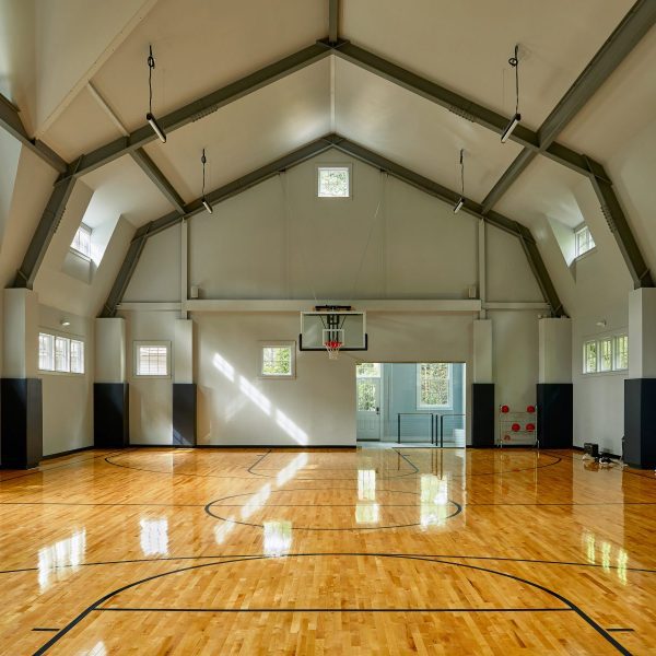 Photo of indoor basketball court in Wellesley, MA residence | Wellesley sports barn